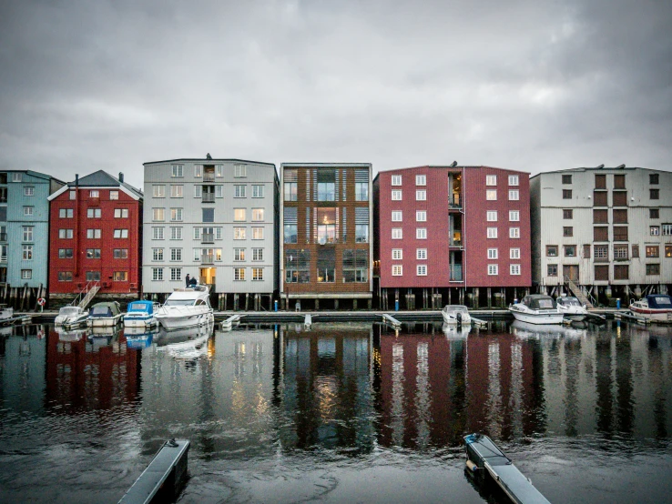 a body of water with boats parked in it