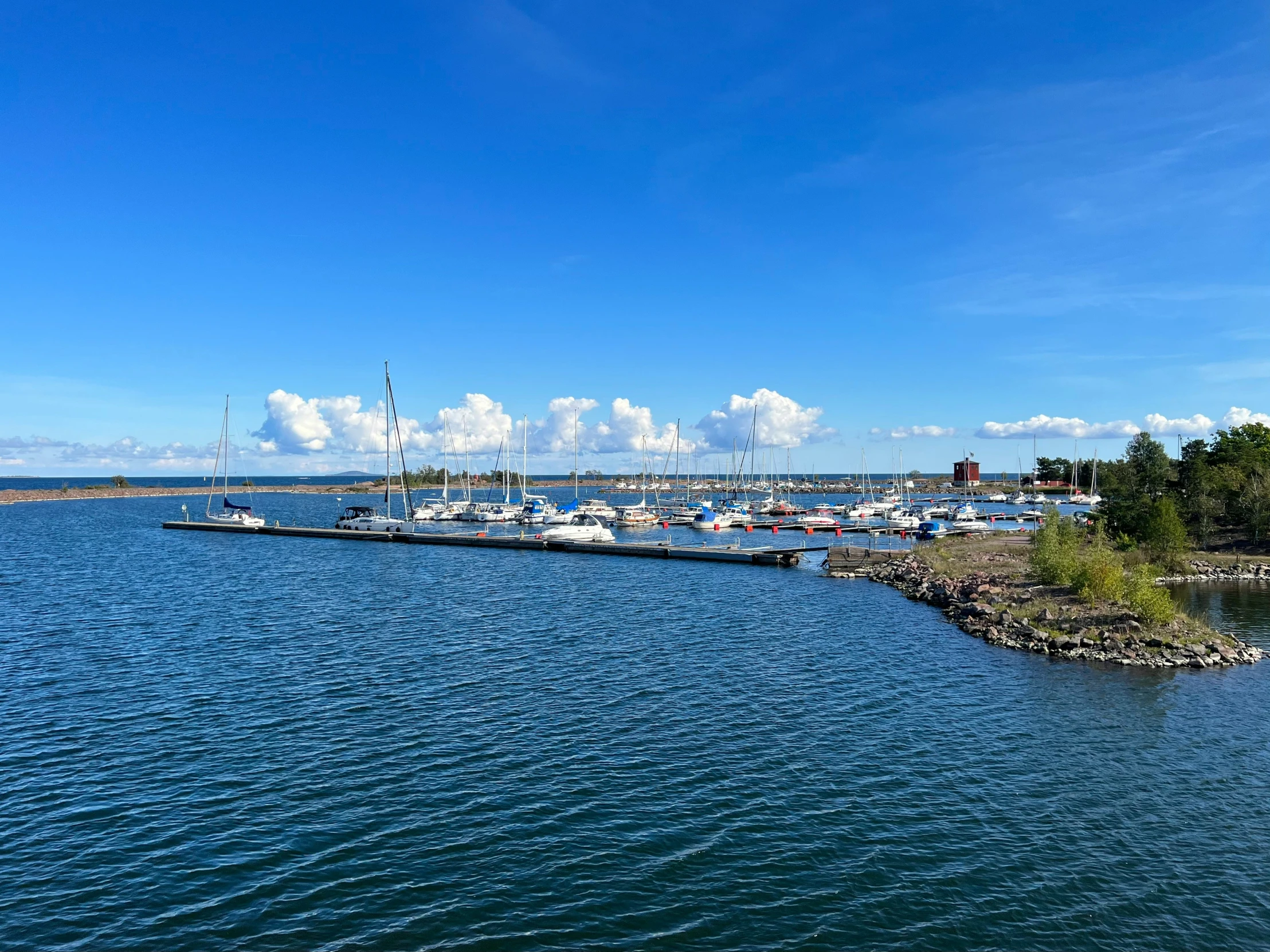 the view looking down at a group of boats in a harbor