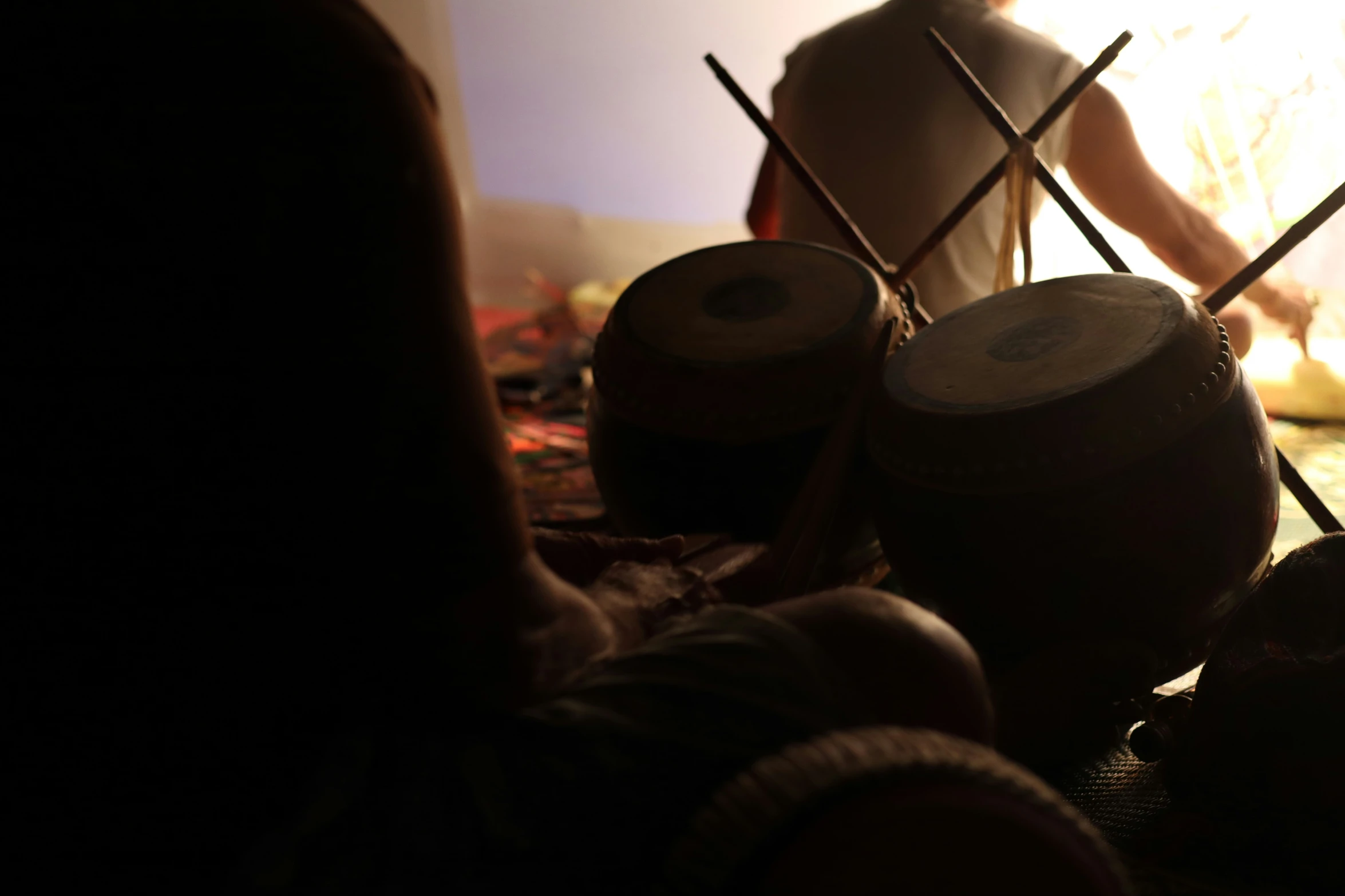 a person playing a musical instrument on a stage