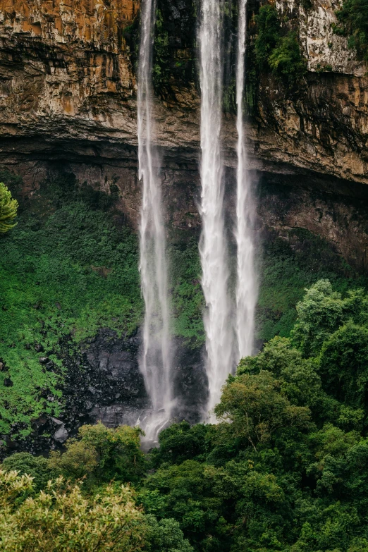 the massive waterfall appears to be being gusted with water