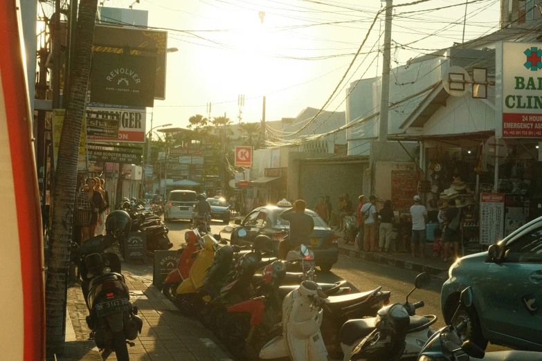 people on motorcycles are lined up along a city street