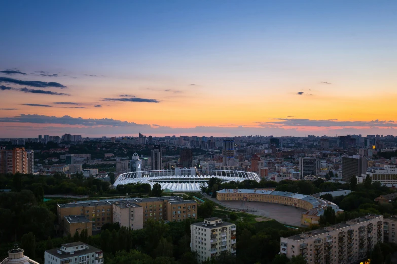 sunset s of city from large area of large buildings