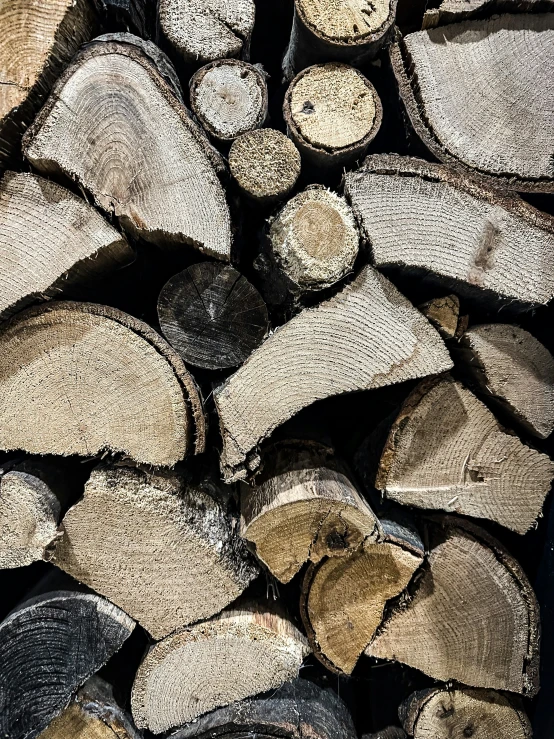some wood is stacked next to each other