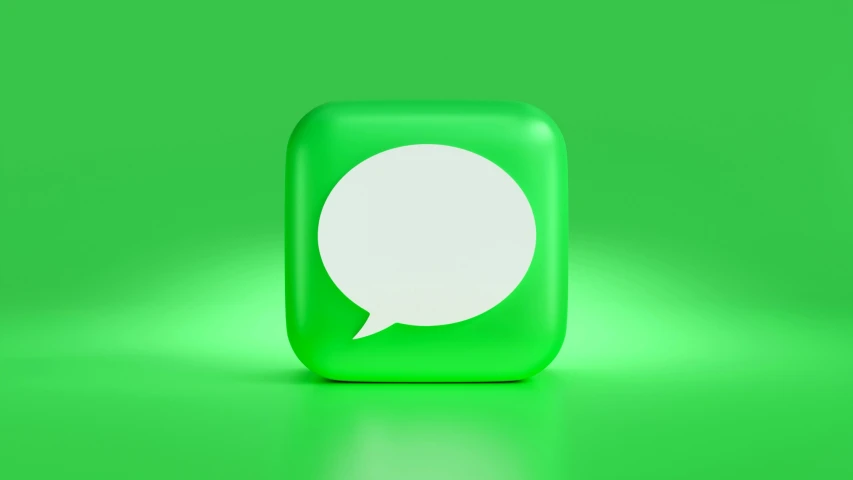 a green square with a speech bubble placed on top of it
