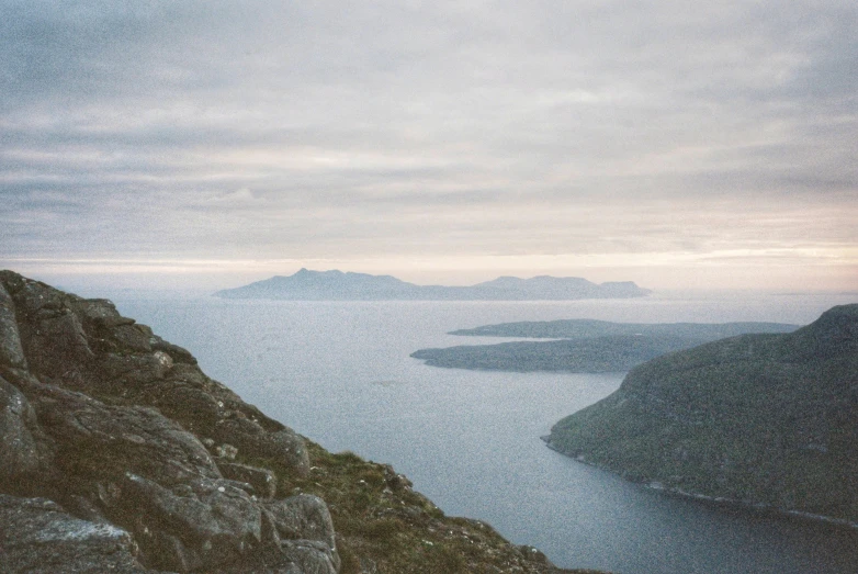 the view from atop the mountain overlooking the lake