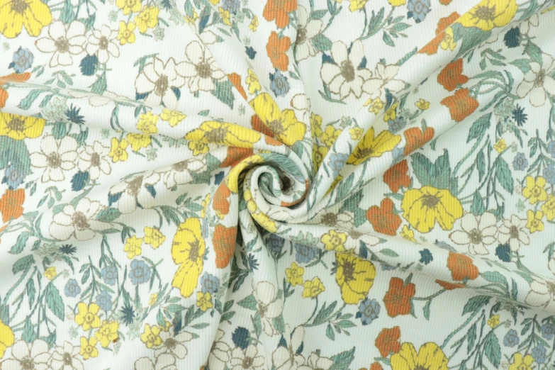 the fabric has been made from a large print with colorful flowers