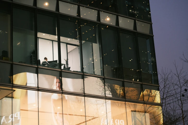 people look at the view from an office building