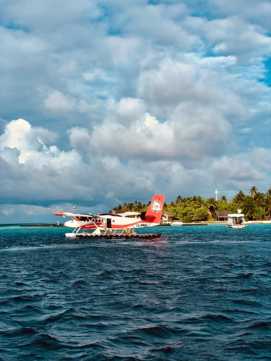 two sea planes are out on the ocean