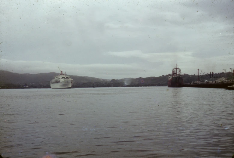 two boats are out in the water