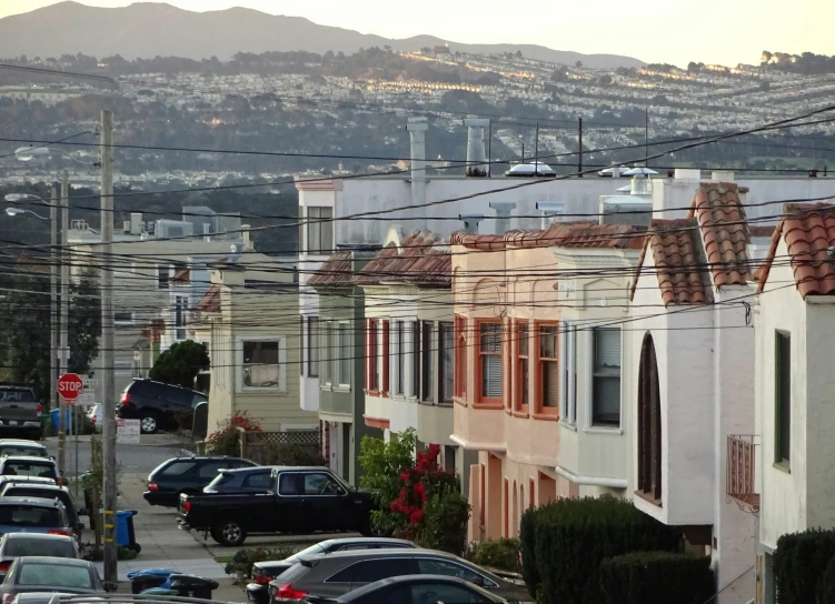 a city with lots of traffic is seen on this street