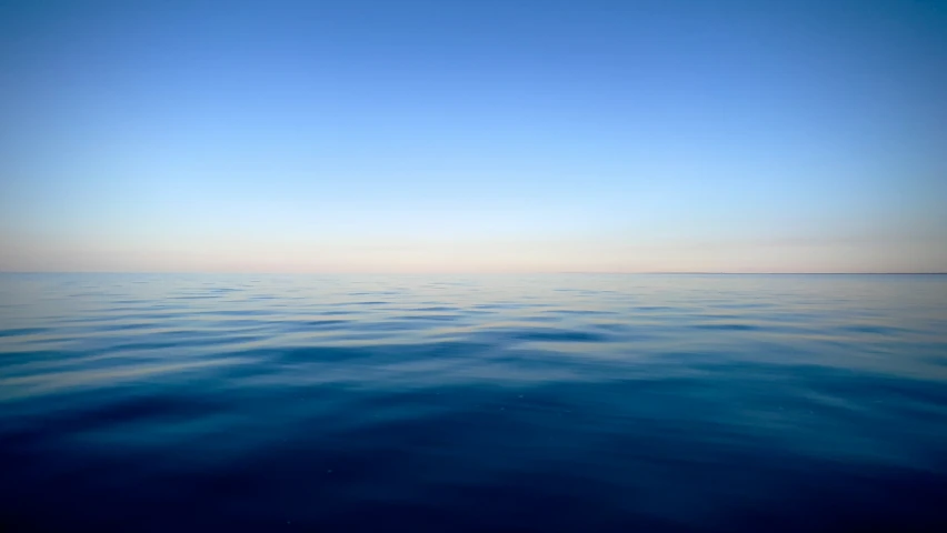 the water is mostly calm and blue