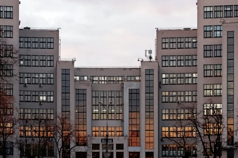 the front of the building is tall and white