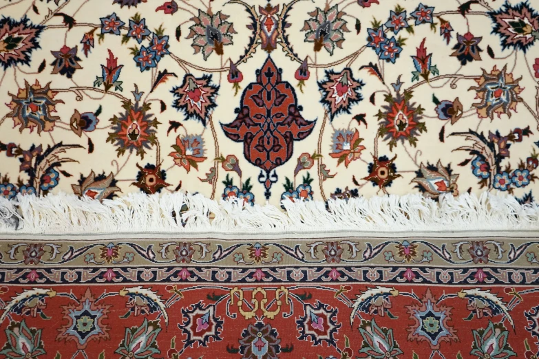rugs with different patterns and colors on white ground