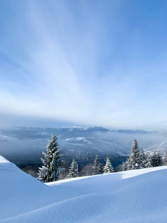 a snowboarder is in the midst of some skiing