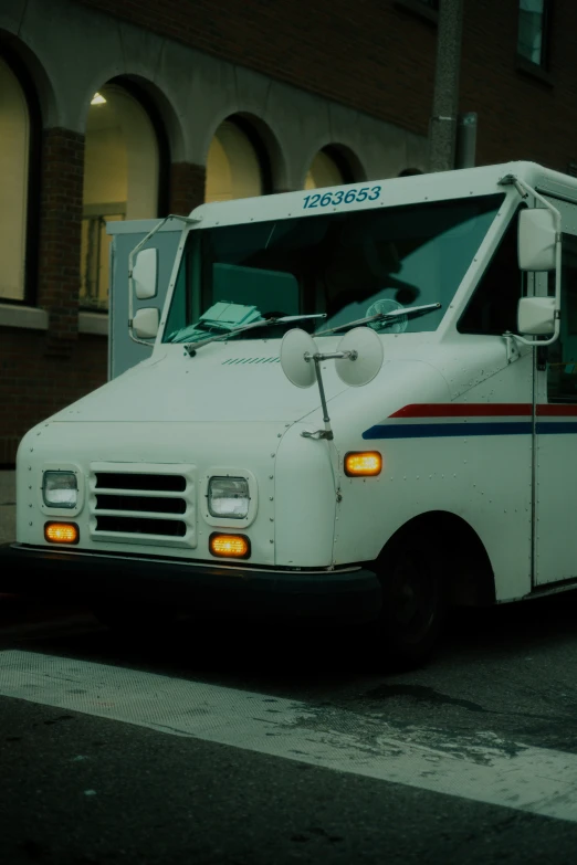 a food truck sits parked on the side of the road