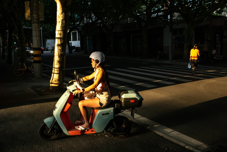 a person riding on the back of a motorcycle