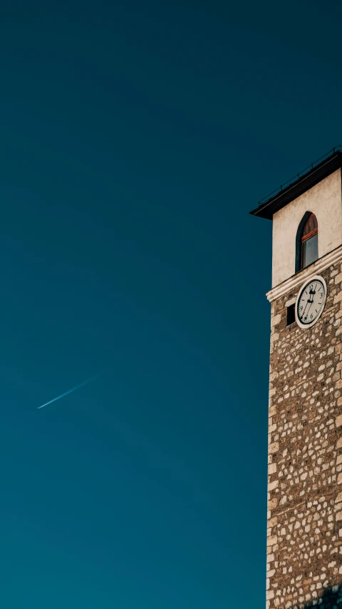 a po of an old brick clock tower