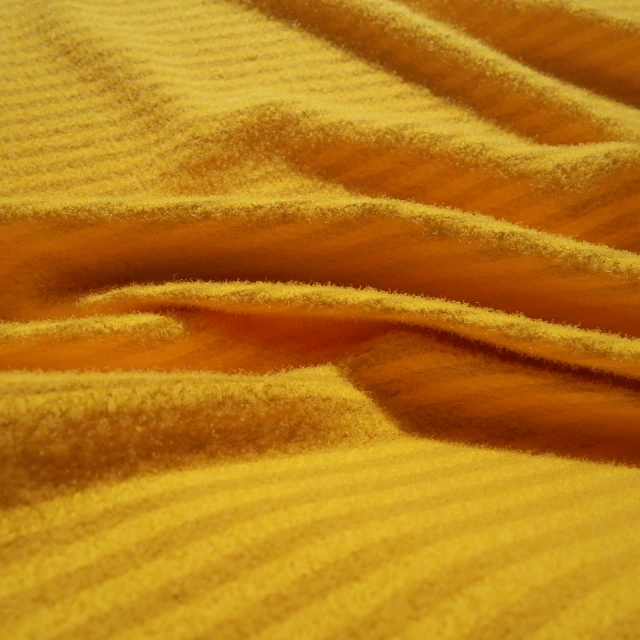 a close up po of an orange area with a soft fabric