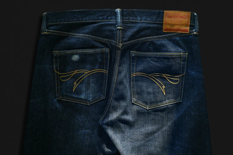 a pair of jeans on display, with the jeans folded down