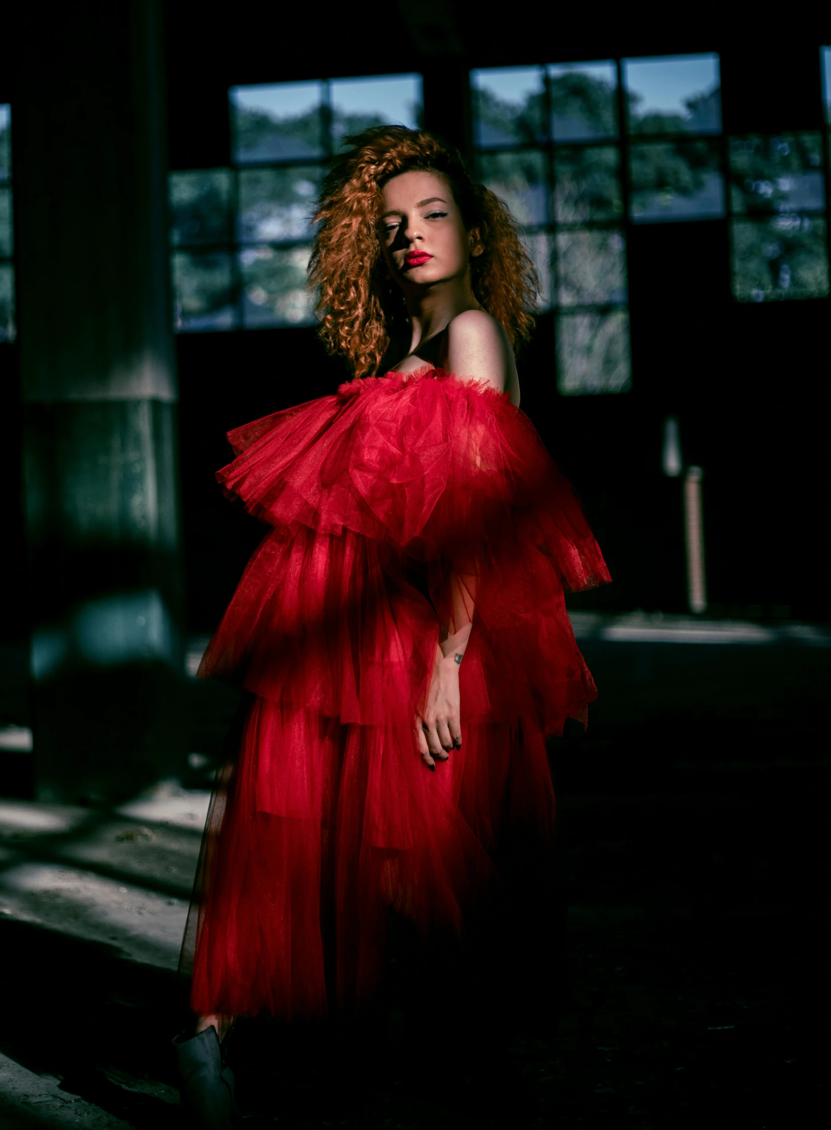 an image of a woman that is wearing a red dress