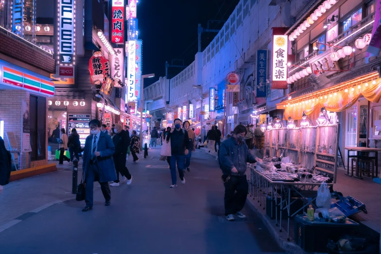 a busy city street is lined with people walking