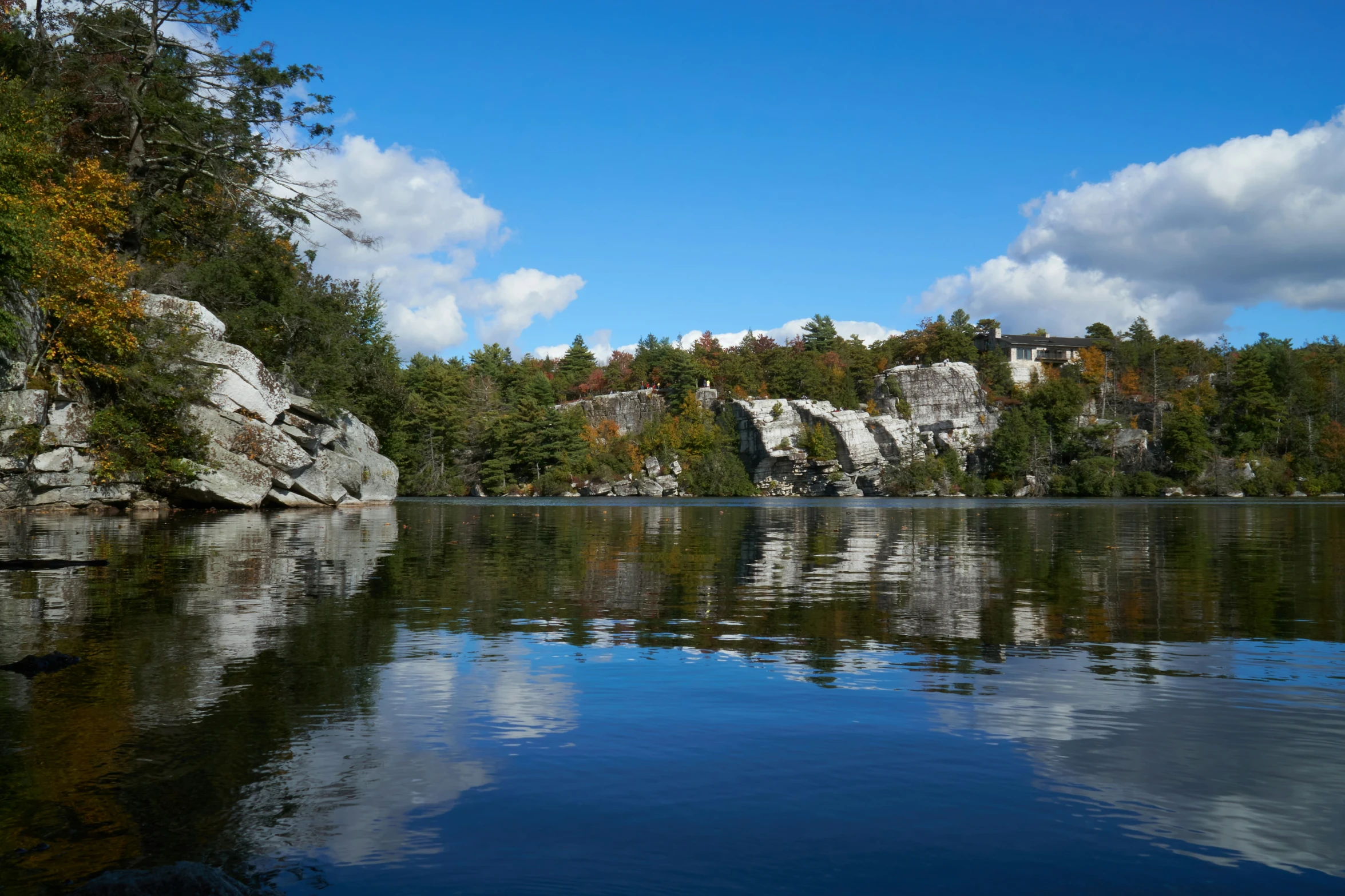 an area is shown with large rocks and water