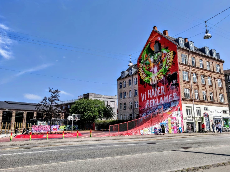 the corner with a street and a giant display