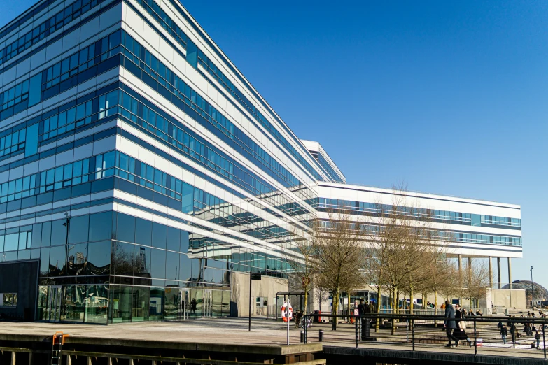 a building with lots of glass on top of it