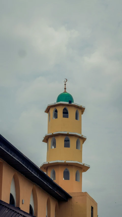 a tower with an elaborate dome on top of it