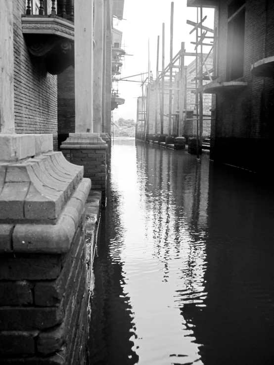 the narrow waterway runs down to the boat house