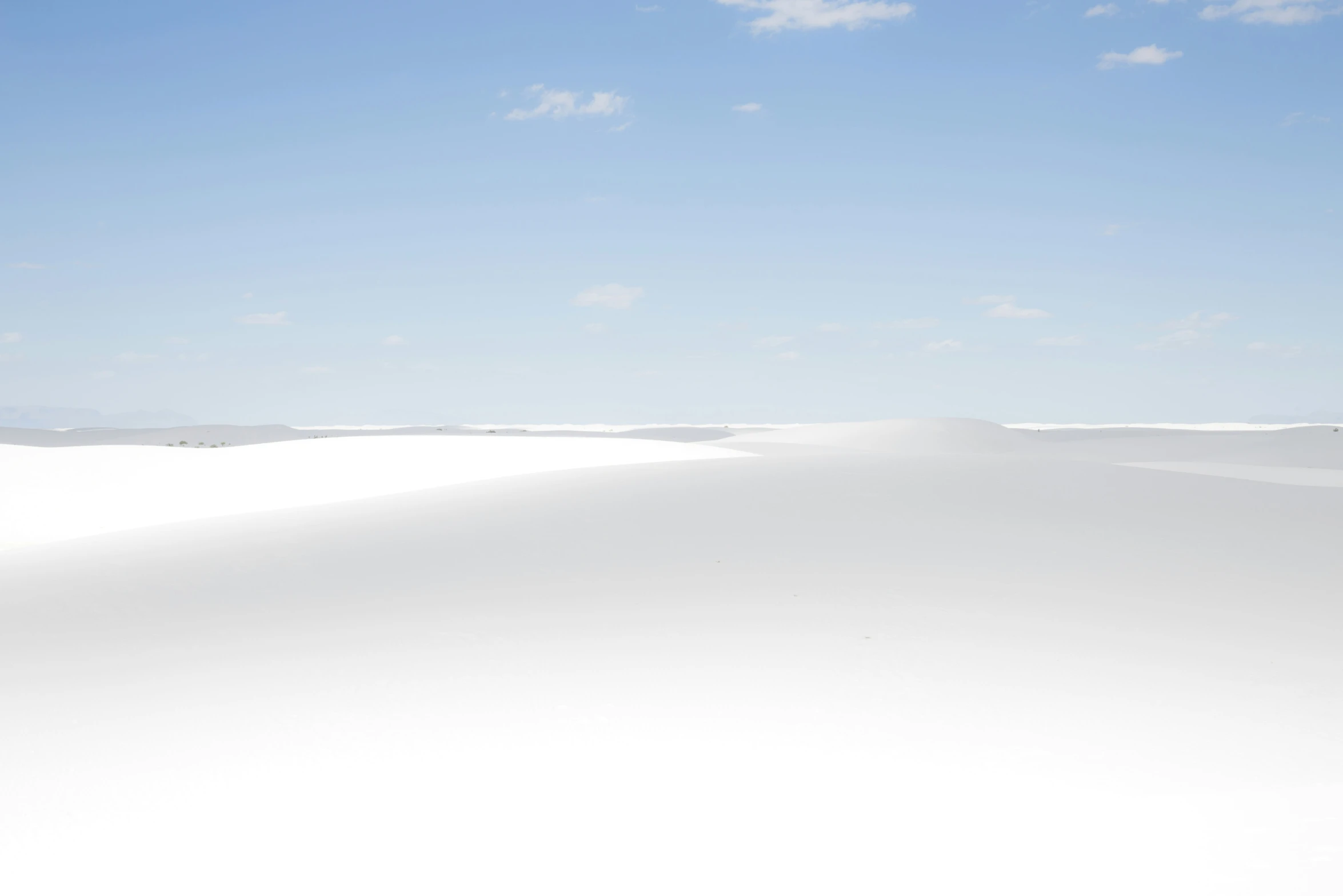 white sands with sky and clouds on a bright day