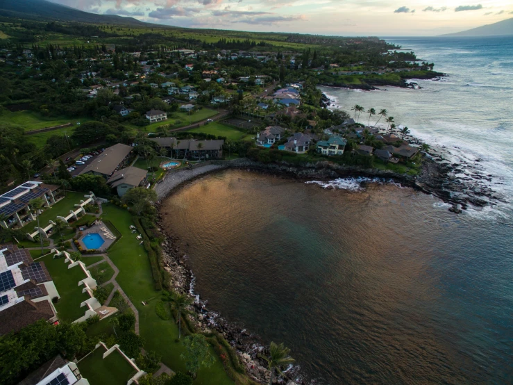 the house sits next to the beautiful waterfront