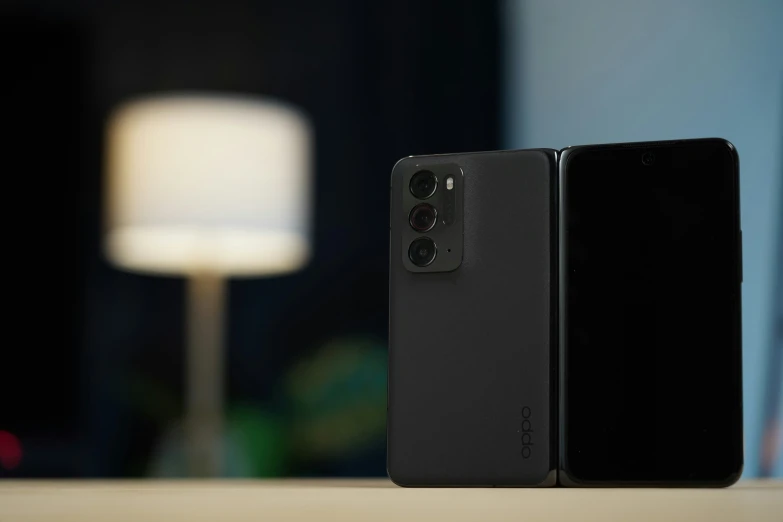 two different versions of oneplus phone in black