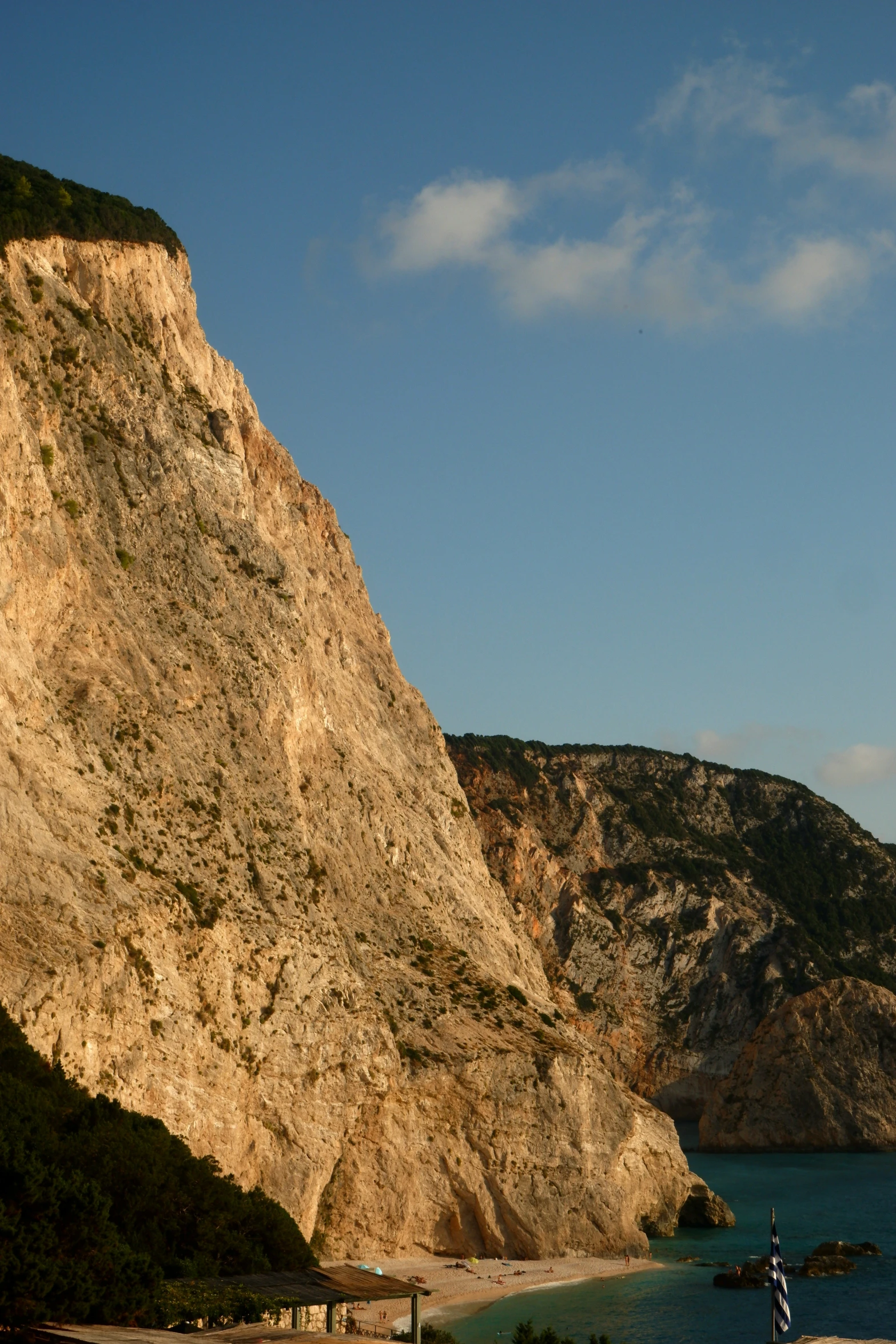 an airplane is flying over a large rocky area