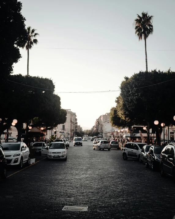 a street with cars parked on the side