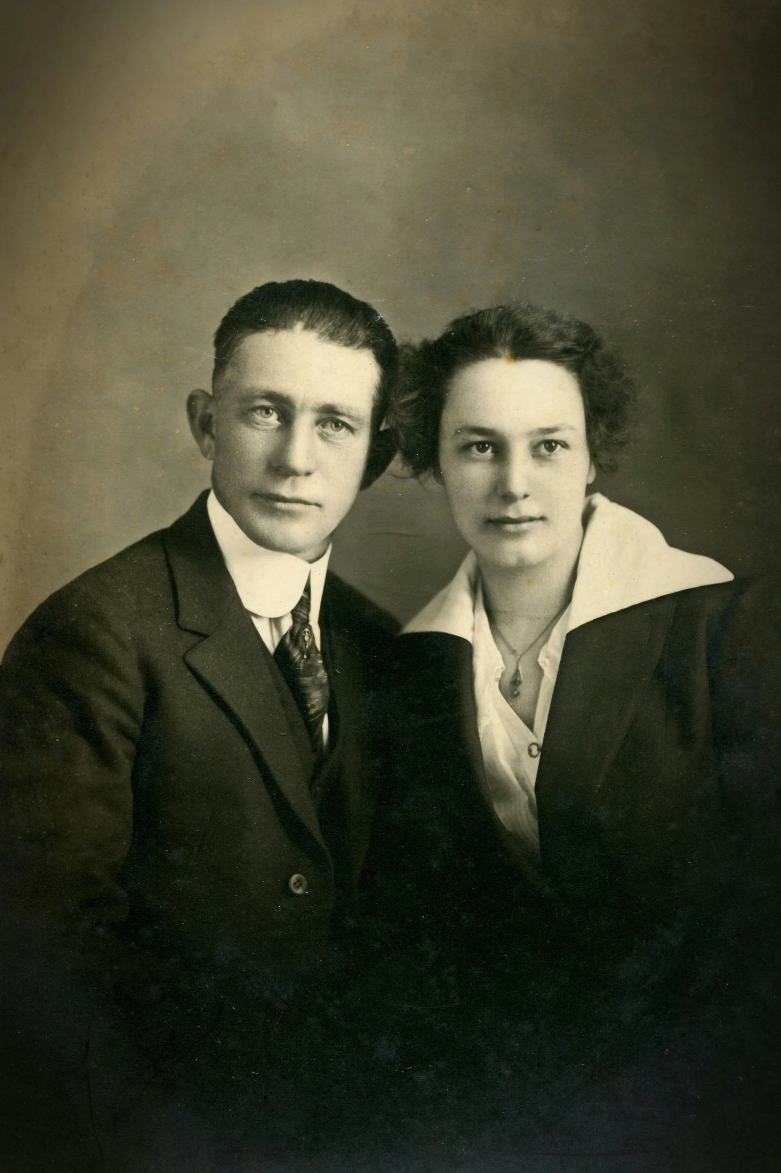 black and white pograph of two people standing together