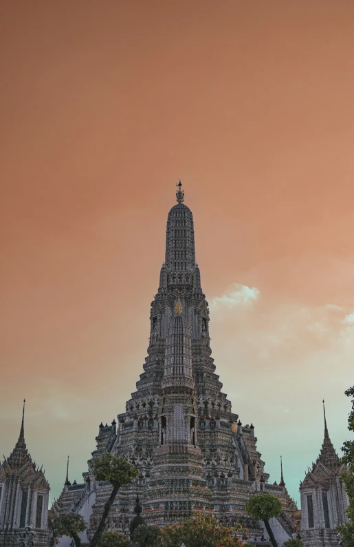 a large temple is in the middle of an overcast day