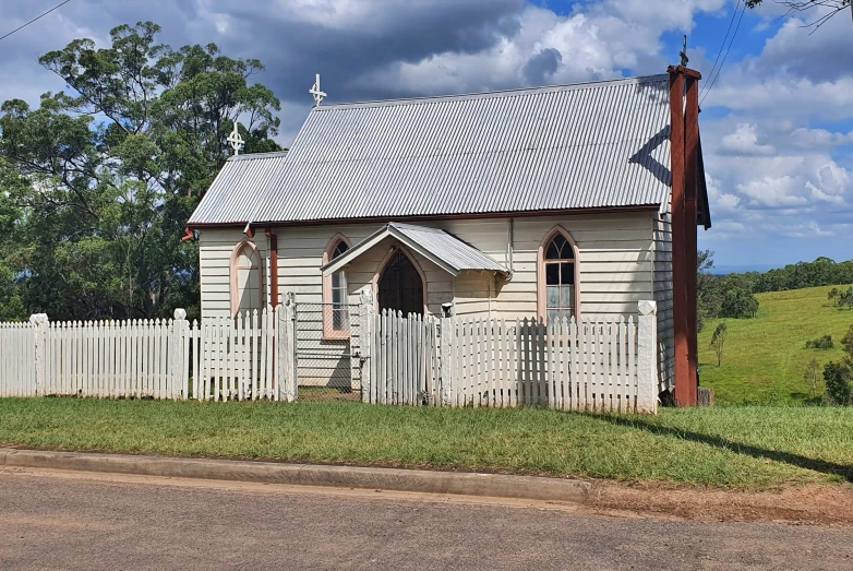 the old church is on the corner of the street