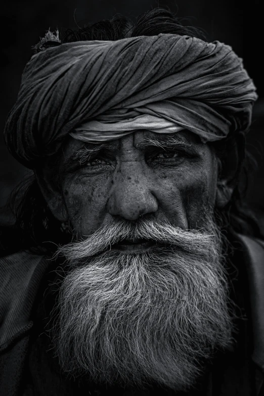 this old man's beard has been trimmed with a head cover