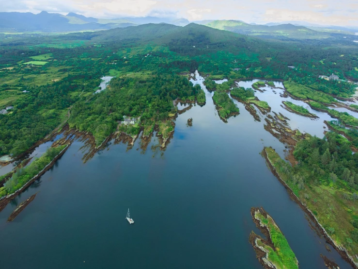 there is an aerial po of a small boat in the water