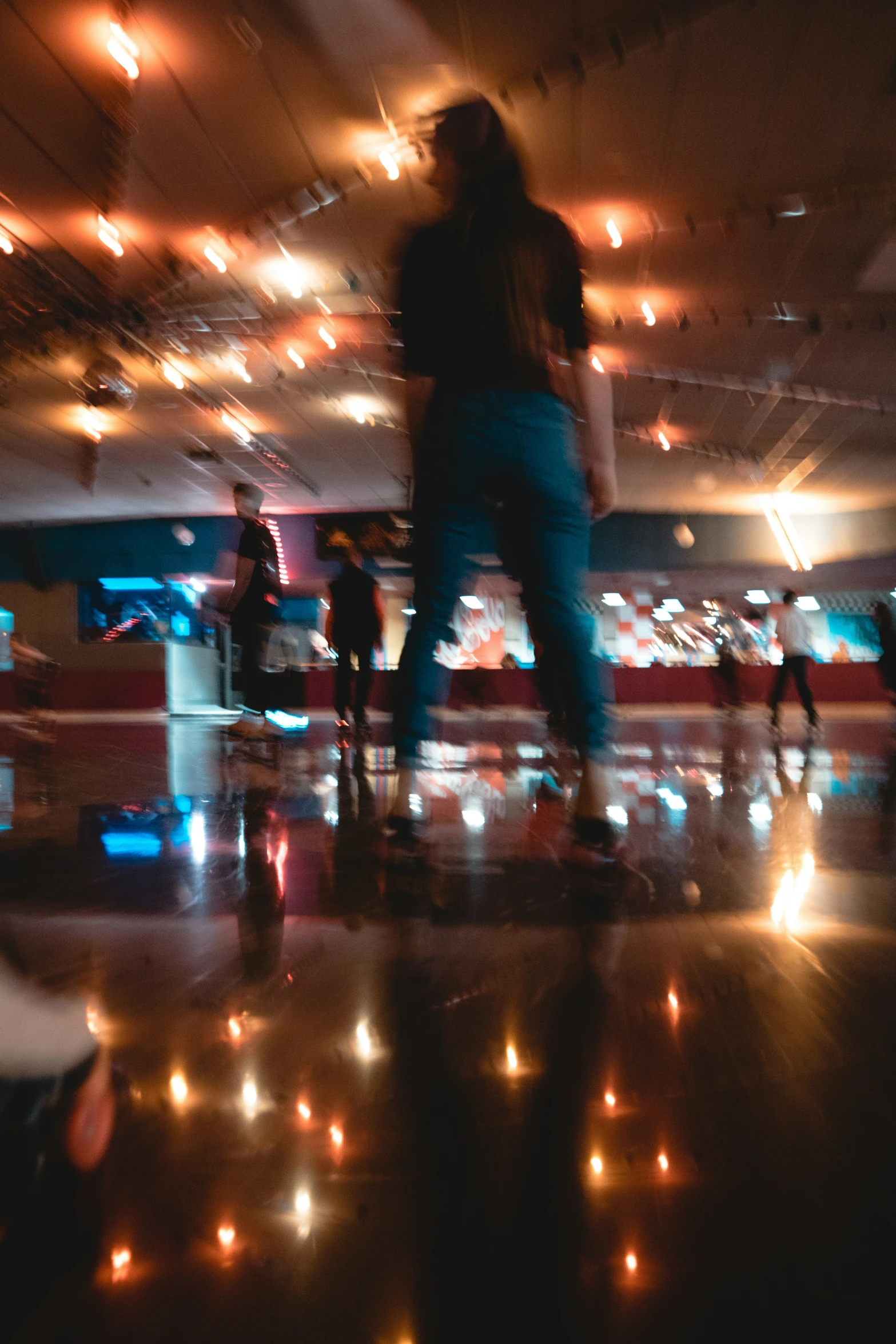 blurry pograph of a group of people walking through an airport