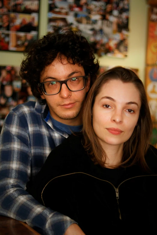 a man and woman sitting next to each other