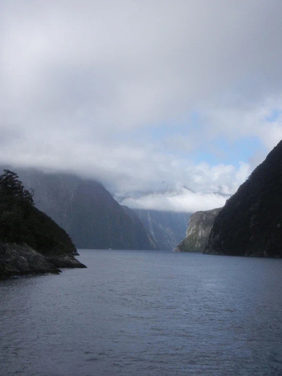 lake with very little snow in the mountains