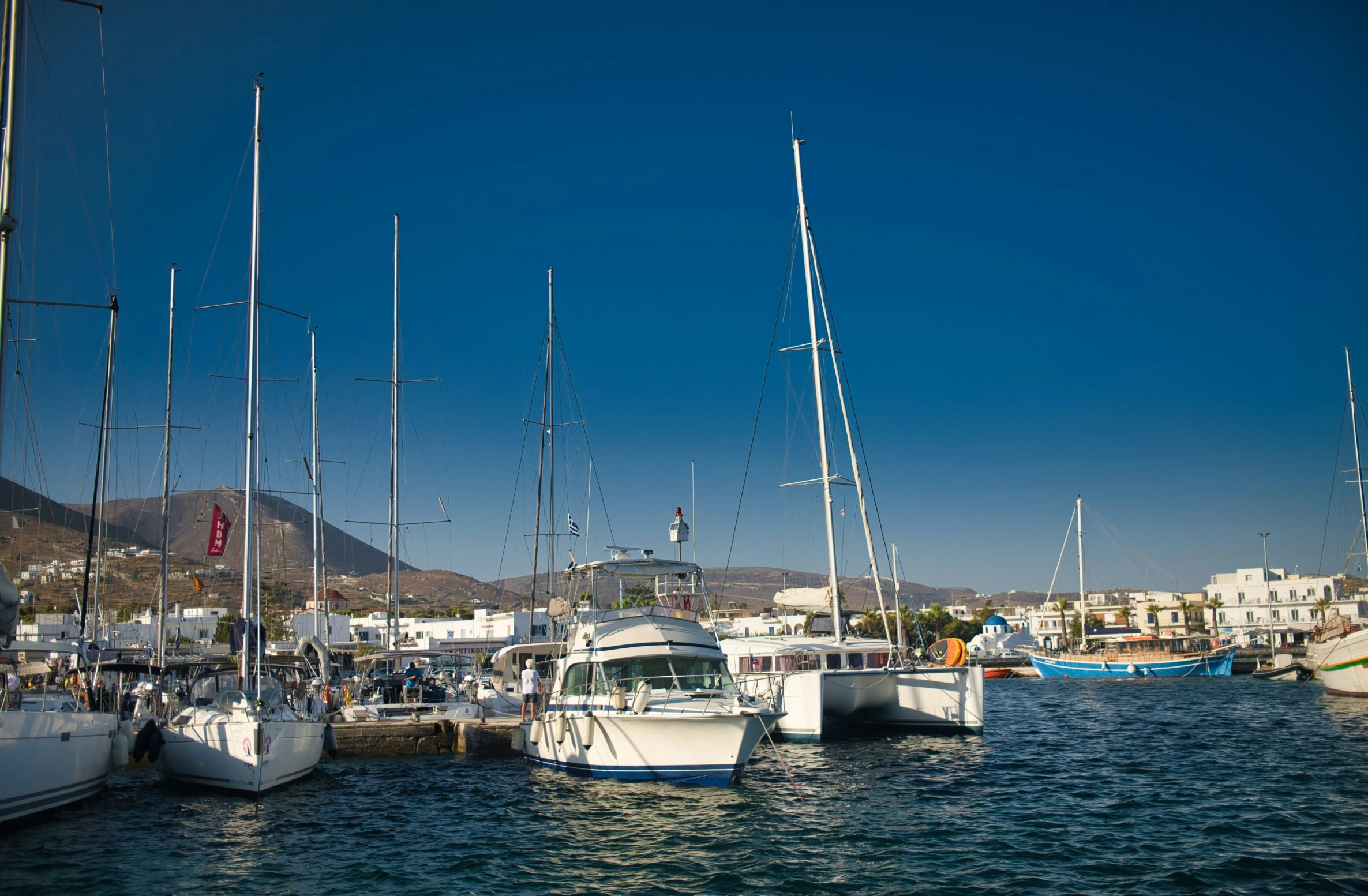 several boats are docked in the harbor