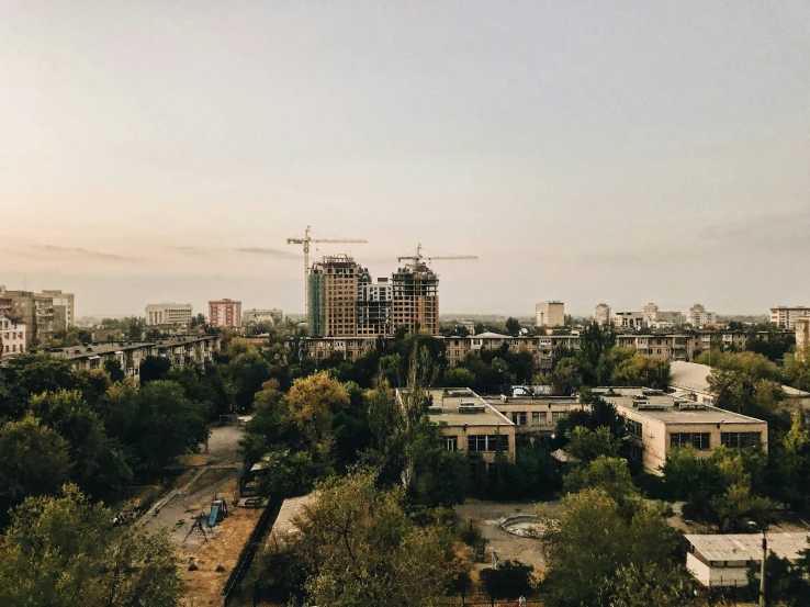 an elevated city view with some buildings in the background