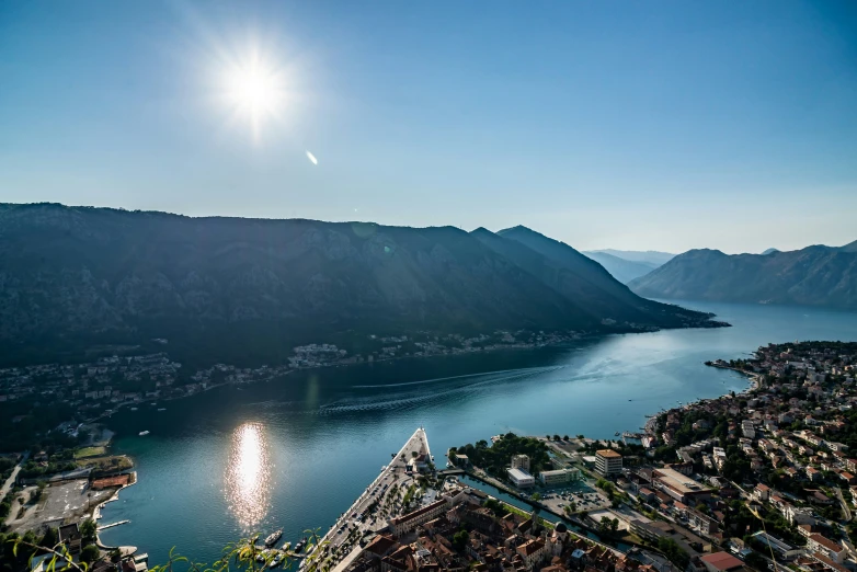 the sun shines on an aerial view of a lake