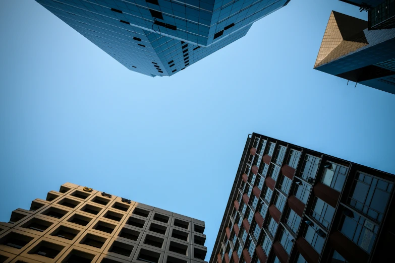 the tops of tall buildings in a city