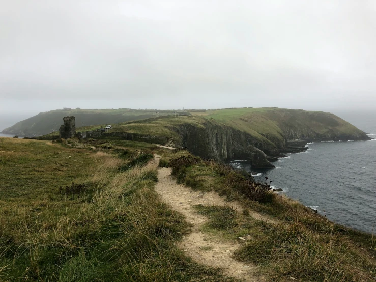 view of a small grassy island and its path