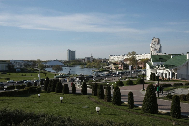 there is a garden on a hill with lots of trees