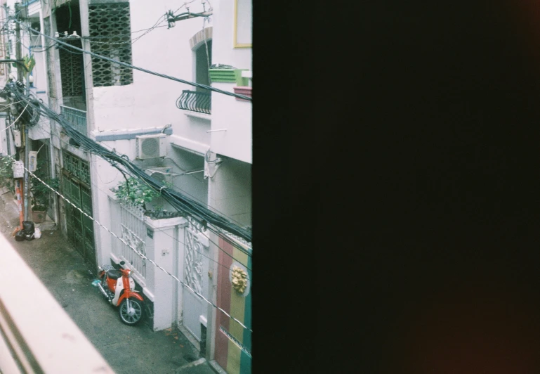 a motorbike parked on the side of a building